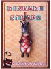 Black Otter Rex Rabbit Kinbaku Charm on display card